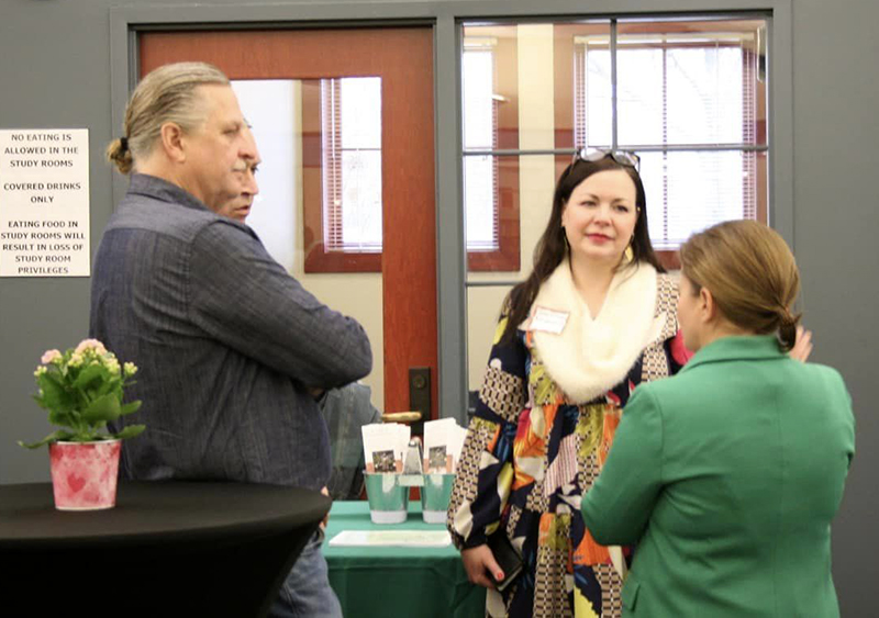 Flossmoor Mayor Michelle Nelson, right, chats with residents at the village's Taste of Flossmoor welcome event on April 1. (Provided photo from village of Flossmoor Social Media/Amelia Wachtel)