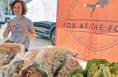 Morgan Snedden and her husband Josh produce gorgeous greens at their farm, Fox at the Fork, in Monee. (Karen Torme Olson/H-F Chronicle)