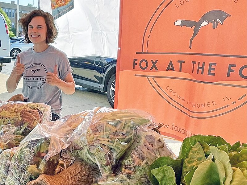 Morgan Snedden and her husband Josh produce gorgeous greens at their farm, Fox at the Fork, in Monee. (Karen Torme Olson/H-F Chronicle)