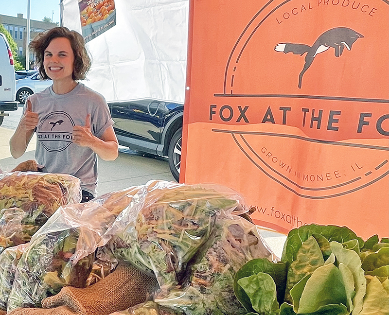 Morgan Snedden and her husband Josh produce gorgeous greens at their farm, Fox at the Fork, in Monee. (Karen Torme Olson/H-F Chronicle)