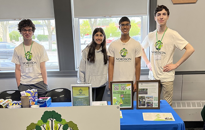 Nordson Green Earth Foundation junior board members, from left, Scott Duwe, Alina Raichand, Nikhil Raichand and Alexander Patris help celebrate Earth Day at the Homewood Science Center on April 22. (Nuha Abdessalam/H-F Chronicle)