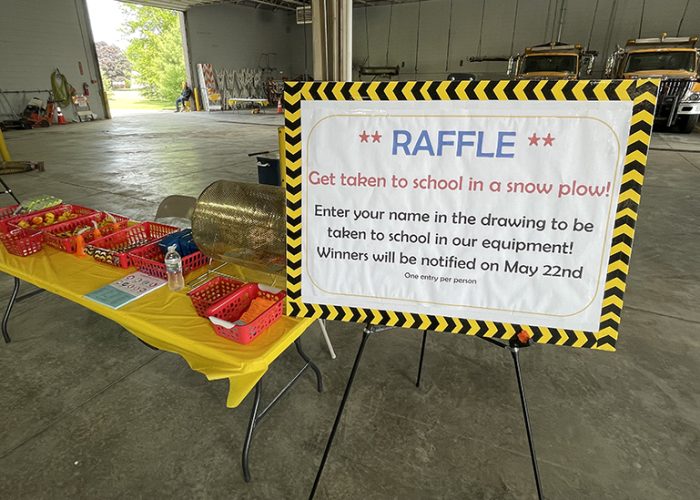 Youngsters could win a ride to school in a snow plow if they entered a raffle during the open house at Homewood’s Public Works building May 20. (Christian Villanueva/H-F Chronicle)