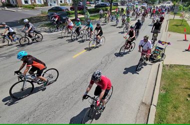 Riders head west from the Infant Jesus of Prague School parking lot at the start of the 2023 Bike the Gem ride. (Eric Crump/H-F Chronicle)