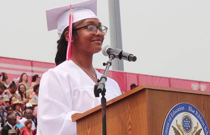 Senior Class President Nicole Guyton delivers remarks at the 2023 H-F High graduation ceremony. (Eric Crump/H-F Chronicle)
