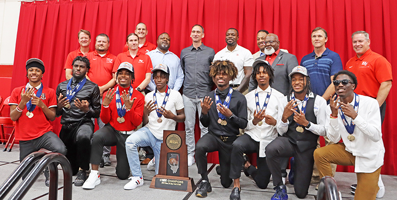 In the front row is the H-F High track team's "eight-man army" of sprinters who helped deliver a state championship for the team. In the back row are the Viking coaches. (Provided photo)