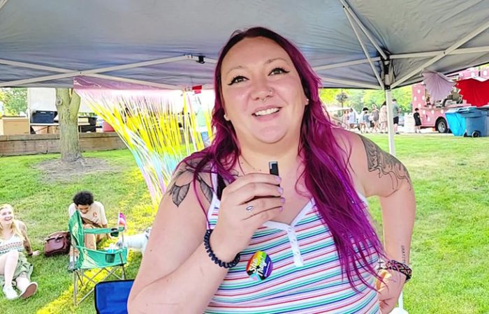 Emalee Kay, owner of Creative Approaches to Therapy in Homewood describes a new group she's offering for LGBTQ+ and neurodivergent youth. (Eric Crump/H-F Chronicle)