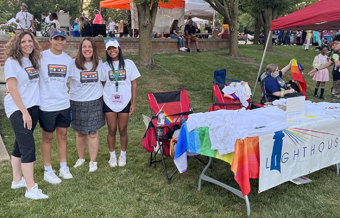 From left, Kelly Rose, Ariel Rose, Stephanie Wright and Brooke Barber at the Lighthouse LGBTQ table at Starry Nights 2023. (Nick Ulanowski/H-F Chronicle)