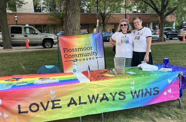 Brooke King-LaBreck, left, and Rev. Julie Van Til at the Flossmoor Community Church table at Starry Nights/Pride Night on June 9. (Nick Ulanowski/H-F Chronicle)