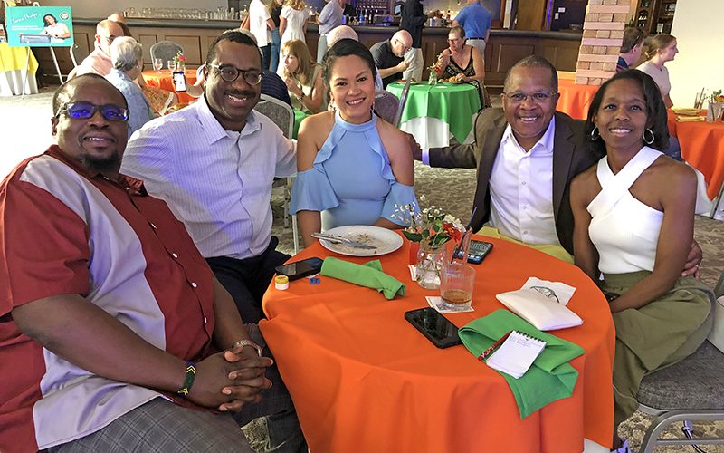 Gathered around the table are, from left, Paschal Nydouya, Kobie Douglas, Patty Douglas, Elston Terrell, and Daria Terrell. (Marilyn Thomas/H-F Chronicle)