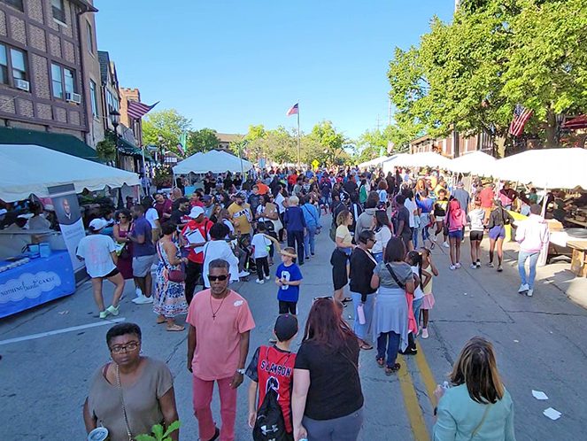 The Flossmoor Fest crowd fills Sterling Road in this view looking north. (Eric Crump/H-F Chronicle)
