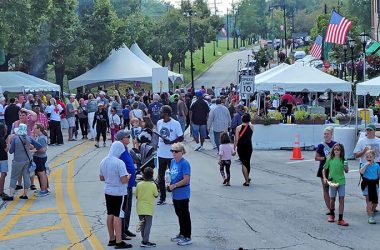 Sterling Avenue, looking south, begins to fill with people early Saturday afternoon during Flossmoor Fest. (Eric Crump/H-F Chronicle)