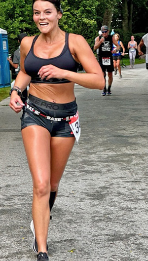 After running for nine miles, Julie Gebel still seems to be enjoying herself. (Karen Torme Olson/H-F Chronicle)