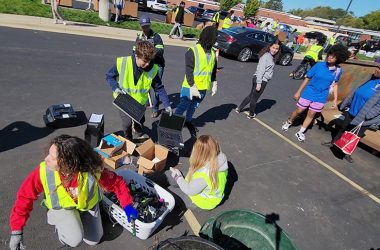 Volunteers sort through electronic devices brought to Recyclepalooza on Oct. 7. (Eric Crump/H-F Chronicle)