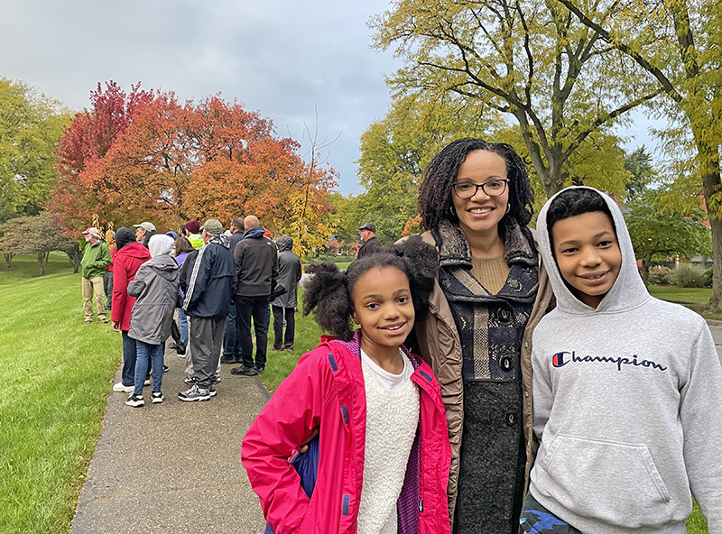 Flossmoor’s, from left, Mika, 10; Christian, 12; and Nia Mathis pose for a photo near Leavitt Park during the village’s first Guided Fall Tree Walk on Thursday, Oct. 19. (Bill Jones/H-F Chronicle)