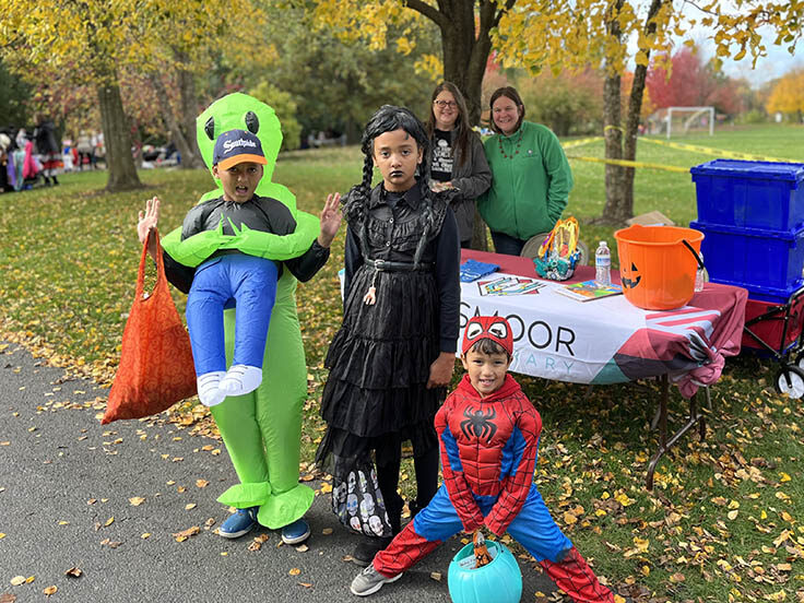 Averie Huff, 8, with twin Ashton Huff and brother Alijha Huff, 3, during Trick or Treat Trail. (Nuha Abdessalam/H-F Chronicle)