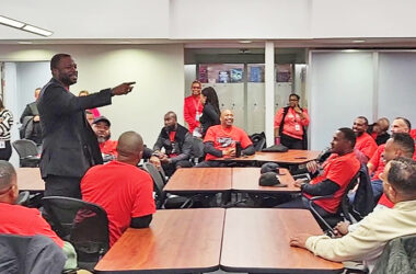H-F Principal Clinton Alexander, left, leads a discussion on Oct. 30 among the men participating in the second annual Dad Squad event. (Eric Crump photos/H-F Chronicle)