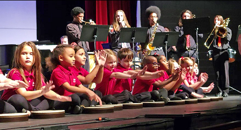 The Bel Canto Children's Choir gets into the rhythm during the choir concert in November.