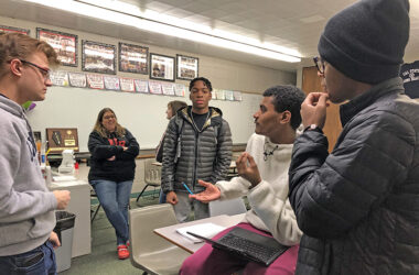 Tarendran Heyward, seated, makes a point in discussion with fellow H-F Debate Club members, from left, Kevin Gibek, Harold Owens, and Undra Pillows. (Marilyn Thomas photos/H-F Chronicle)