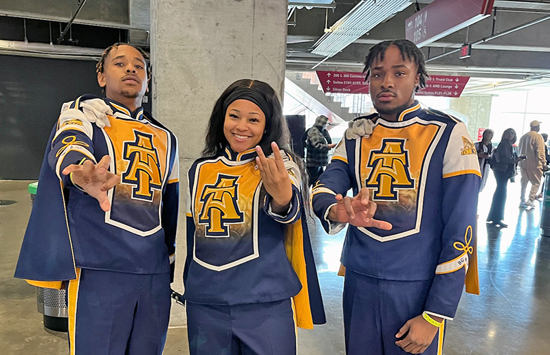 Three 2019 Homewood-Flossmoor High School graduates, from left, Antonio Bonds II, Zahra Harmon-Cohran and Cameron Barton, marched in the 2024 Rose Bowl Parade as members of the Blue & Gold Marching Machine of North Carolina A & T University. (Provided photo)