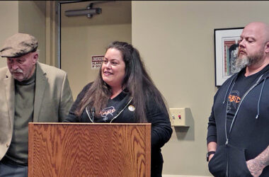 From left, Rabid Ground owner Raiye Rosado describes the craft brewery's community engagement while developer Gene Steinmarch, left, Rabid co-owner Tobias Cichon listen. Rabid is hoping to move from its current home to bigger, more visible space in Park West Plaza on 183rd Street in Homewood. (Eric Crump/H-F Chronicle)