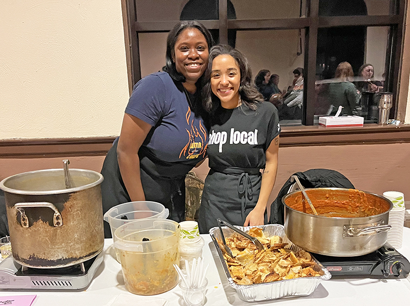 Dunning's Market assistant manager Paris Peebles, left, and Dunning's Market staff member Sydney Gammon serve soups and open-face grilled cheese sandwiches at Soup for the Soul. (Nick Ulanowski/H-F Chronicle)