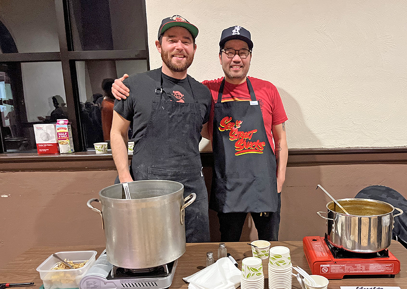 From left, Matt Meschede and Chef Won Kim of Kimksi serve soups during the Soup for the Soul fundraiser Feb. 19. (Nick Ulanowski/H-F Chronicle)