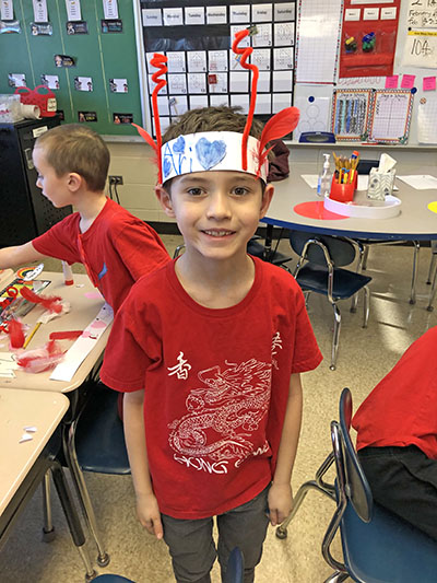 Willow School first grader Ari Gallagher made a Valentine head dress decorated with pipe cleaners and hearts. (Marilyn Thomas/H-F Chronicle)