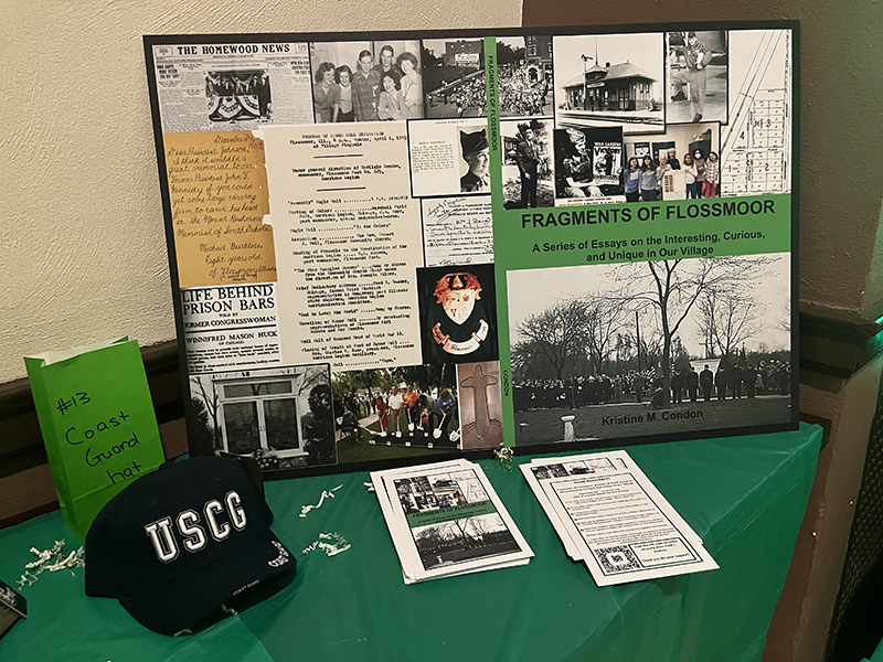 A poster promotes a new book by FVM Secretary-treasurer Kris Condon. Proceeds from "Fragments of Flossmoor" will benefit the Wall of Honor project. (Nick Ulanowski/H-F Chronicle)