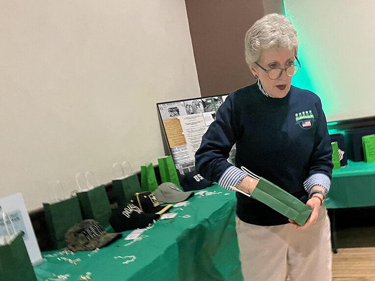 FVM Secretary-treasurer Kris Condon randomly selects a winning raffle ticket. (Nick Ulanowski/H-F Chronicle)