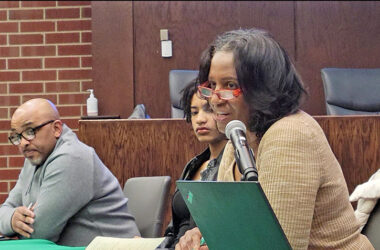 Flossmoor Community Relations Commission Chair Phillipa Leon-Thompson, right, welcomes members of the public to the commission's meeting on March 25 while student member Eva Mathis and commission member Stephen Ramsey, left, listen. (Eric Crump/H-F Chronicle)