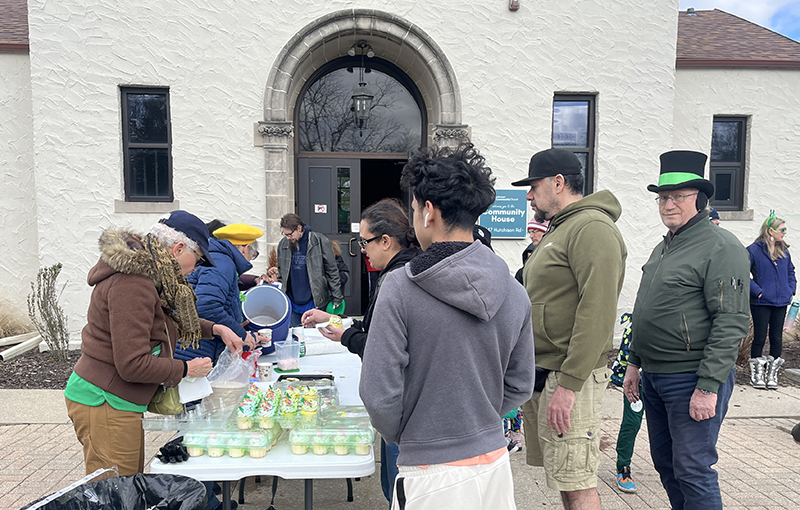 The village provides green cupcakes and cookies to community members after the parade. (Nick Ulanowski/H-F Chronicle)