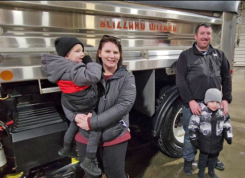 The Cortellini family of Homewood, from left, Gavin, Julie, Nic and Lucas. Nic won the village's Name the Snowplow contest with his Blizzard Wizard entry. (Eric Crump/H-F Chronicle)