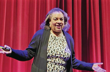 Keynote speaker Michelle Duster traces the parallels in biography and spirit between her great-grandmother, Ida B. Wells-Barnett and Martin Luther King Jr. (Eric Crump/H-F Chronicle)
