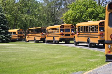 Kicket buses line up at Churchill School in 2019. (Chronicle file photo)