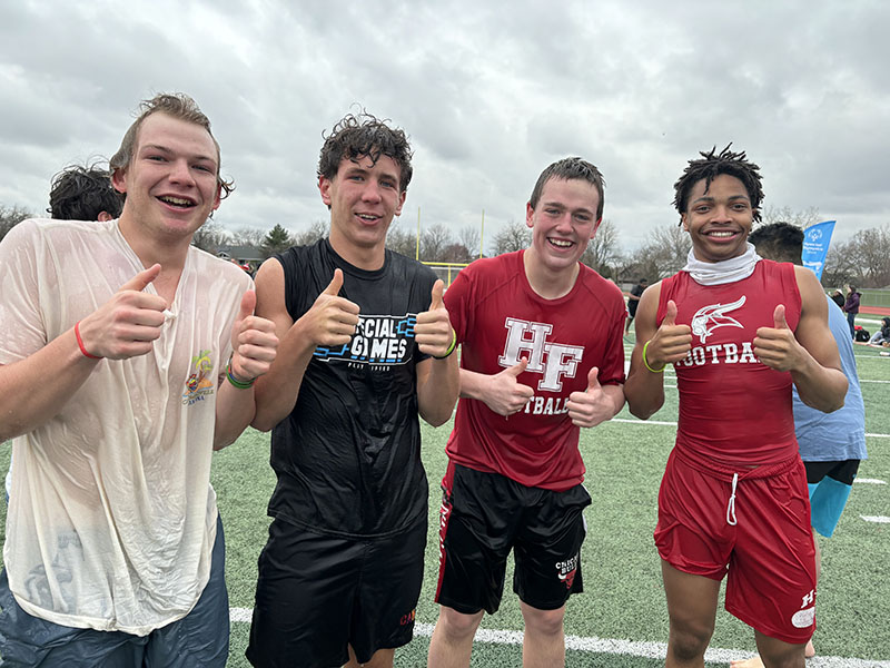 Cold but happy participants in the H-F Polar Plunge are, from left, Nick Calomino, Ryan Custody, Finn Schmidt and Joseph Neal. (Marilyn Thomas/H-F Chronicle)