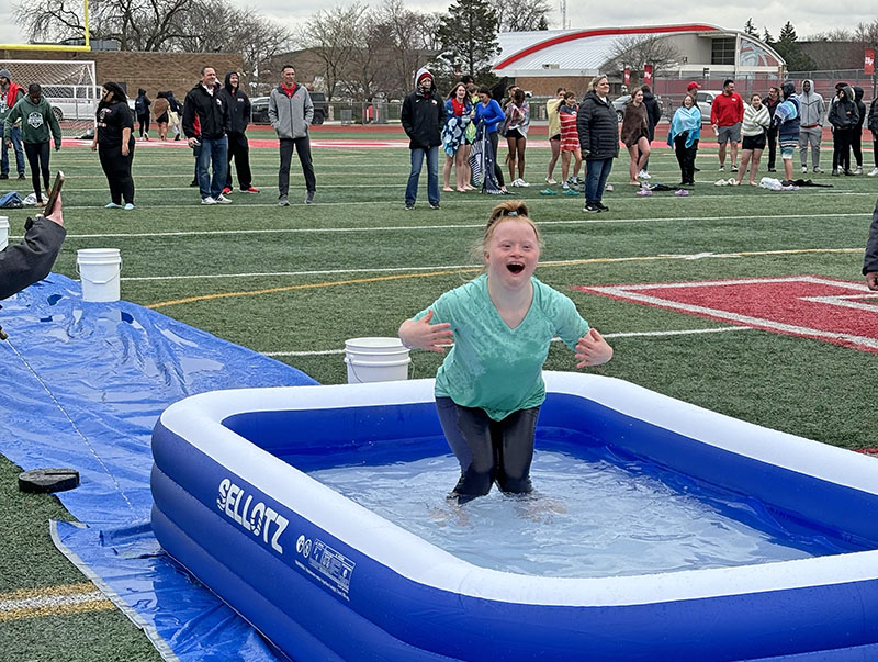 Gigi Bucci's expression gives a hint of what jumping into a cold bath feels like. She was a member of the winning Unified Soccer Team. (Marilyn Thomas/H-F Chronicle)
