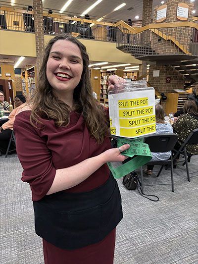 Rosie Joyce, a library staff member in youth services, sold raffle tickets during the party. (Marilyn Thomas/H-F Chronicle)