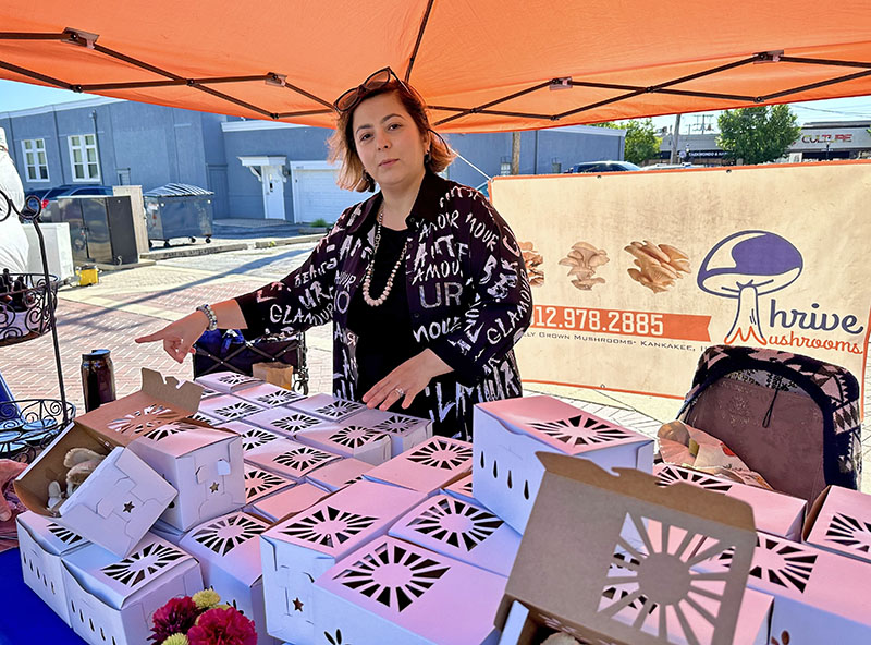 Gulcin Tasyurek of Flossmoor and Thrive Mushrooms explains the benefits of eating Oyster and Lion’s Mane mushrooms and products as well as ways to integrate mushrooms in cuisine. (Karen Torme Olson/H-F Chronicle)