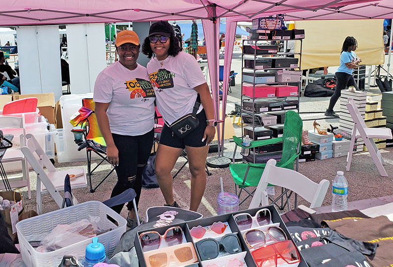 Addie Ogunsanya and Haven Morris take a break from telling people about the #It's Okay Foundation to smile for a picture. (Chris Weber/H-F Chronicle)