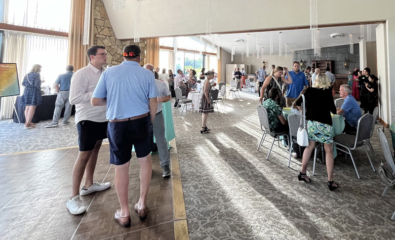 Guests mingle at Idlewild Country Club for Homewood Science Center Summer Fest Fundraiser. (Nuha Abdessalam/H-F Chronicle)