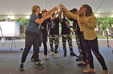 Team Dunning's and Team 3x3 toast each other at the fourth annual Battle of the Chefs, which is now tied with two victories for each team. (Eric Crump/H-F Chronicle)