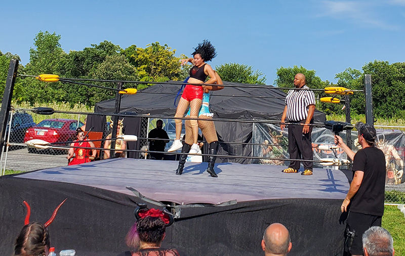 Wrestlers fight it out on the mat at Rabid Brewery's Feast of the Goat Queen festival. (Chris Weber/H-F Chronicle)