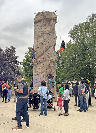 This was the first year to feature rock climbing at Homewood's National Night Out. (Nick Ulanowski/H-F Chronicle)