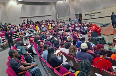 After registering for an interview, hundreds of job applicants enjoy live entertainment while waiting their turn. (Eric Crump/H-F Chronicle)
