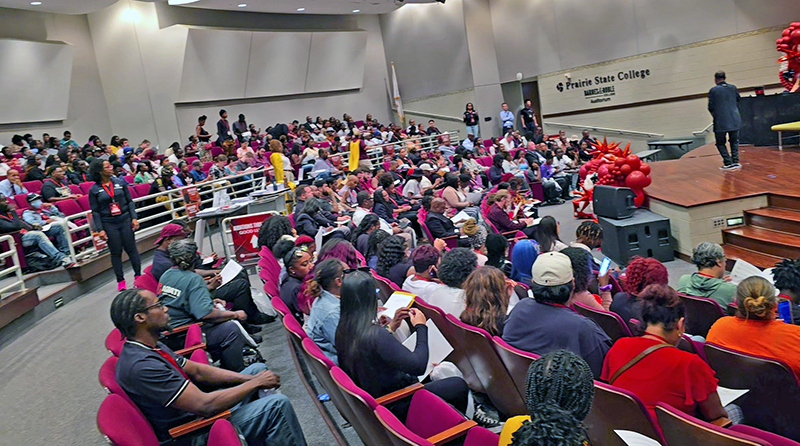 After registering for an interview, hundreds of job applicants enjoy live entertainment while waiting their turn. (Eric Crump/H-F Chronicle)
