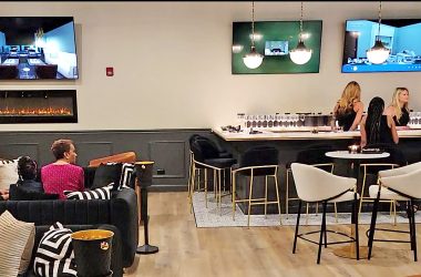 Guests and staff await the ribbon cutting ceremony to mark the opening of Embassy Cigar Lounge in May. The partners in the project, Louis Morgan and Corey Singleton are working to expand the lounge and plan to embark on other business opportunities in the Flossmoor area in the future.