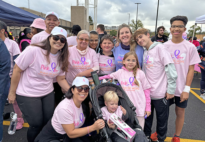 The Rodriguez family walked in honor of their grandmother who died of cancer, and Kelly Rodriguez, in blue, who is undergoing cancer treatments. (Marilyn Thomas/H-F Chronicle)