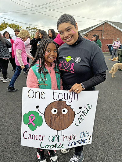 Alexandra Martinez, a breast cancer survivor, came out with her daughter, Charlotte, to walk with Girl Scout Troop 65755. (Marilyn Thomas/H-F Chronicle)