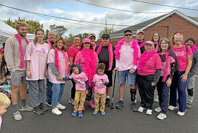 A team of family members walked in honor of their sister Donna Torrez, standing behind the children, who has survived 15 years since her breast cancer diagnosis. (Marilyn Thomas/H-F Chronicle)