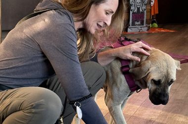Best of Behavior trainer Sonia Fetherling and Darla check out one of the tools used in puppy class. (Karen Torme Olson)